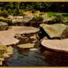 Landscape installation, Bloomington, MN – Turtle rock path with rock bench seats